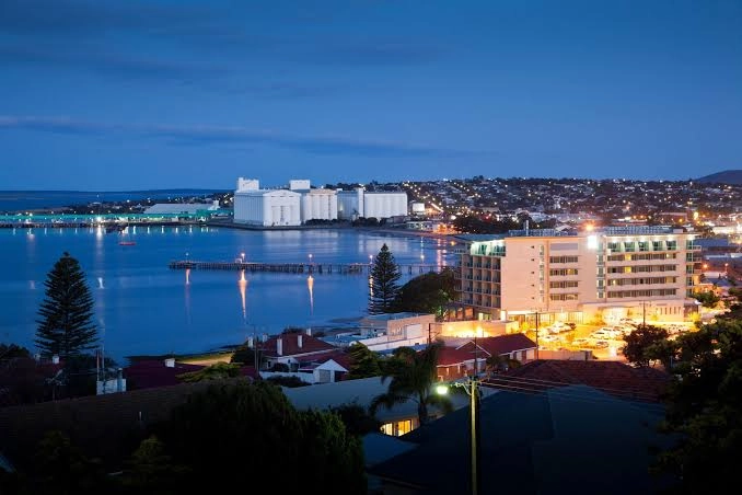 Port Lincoln waterfront and Boston Bay lit up at dusk, South Australia